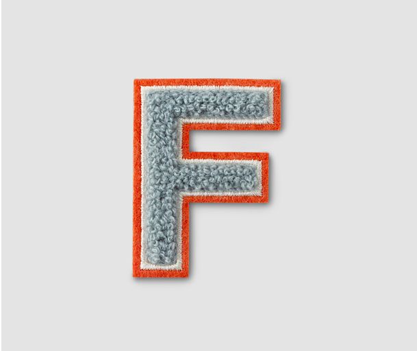 ملصق على شكل حرف F